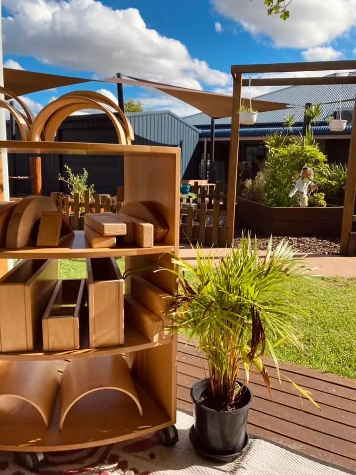 Hand-built wooden archway entrance into the natural play space